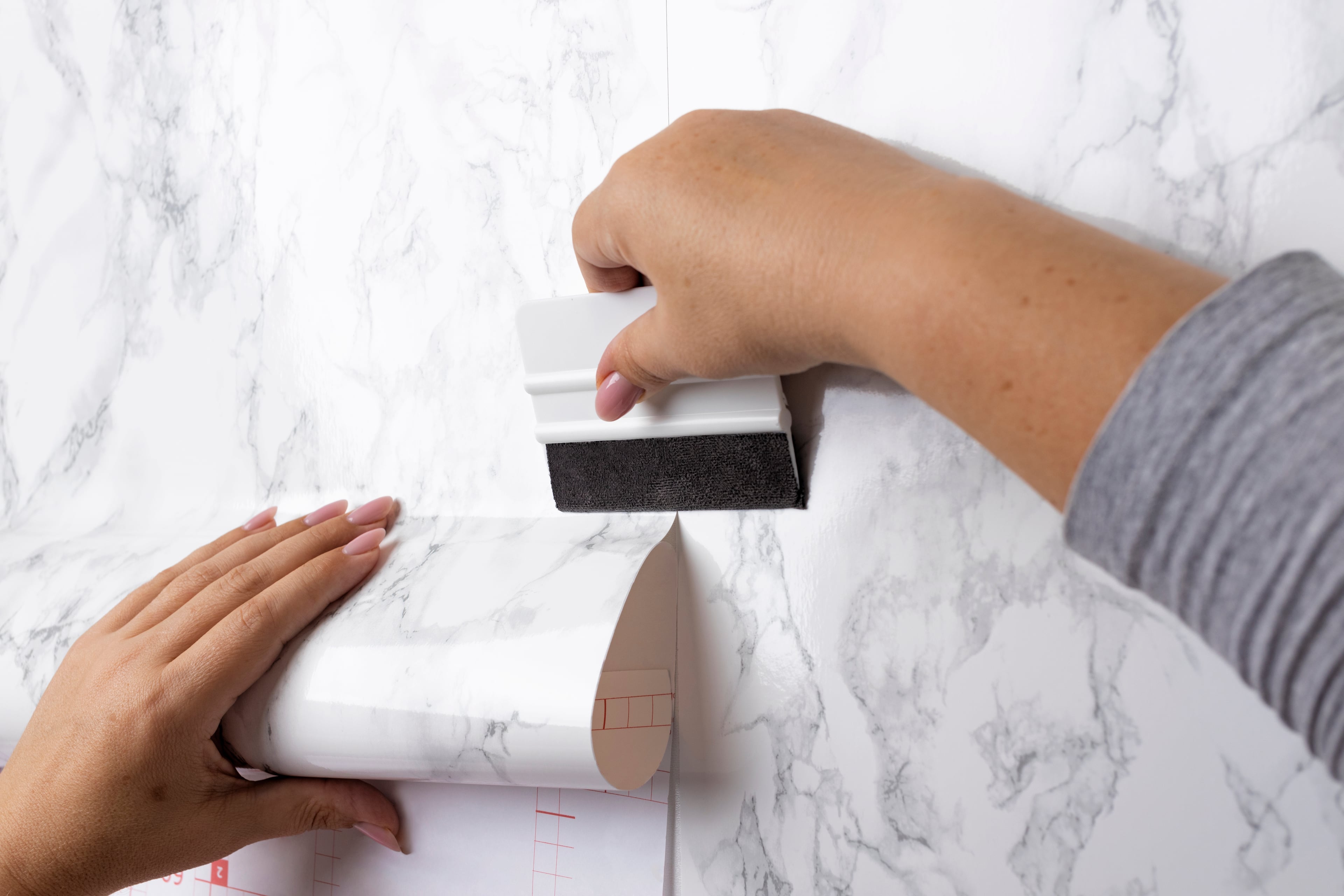 Service de papier peint professionnelle pour murs à Yverdon-les-Bains